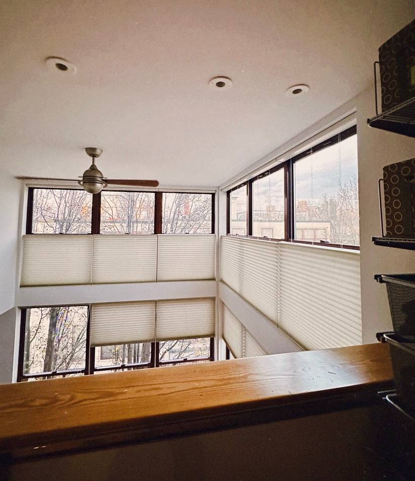 Large balcony with top-down bottom-up shades on a wide window near Southborough, MA