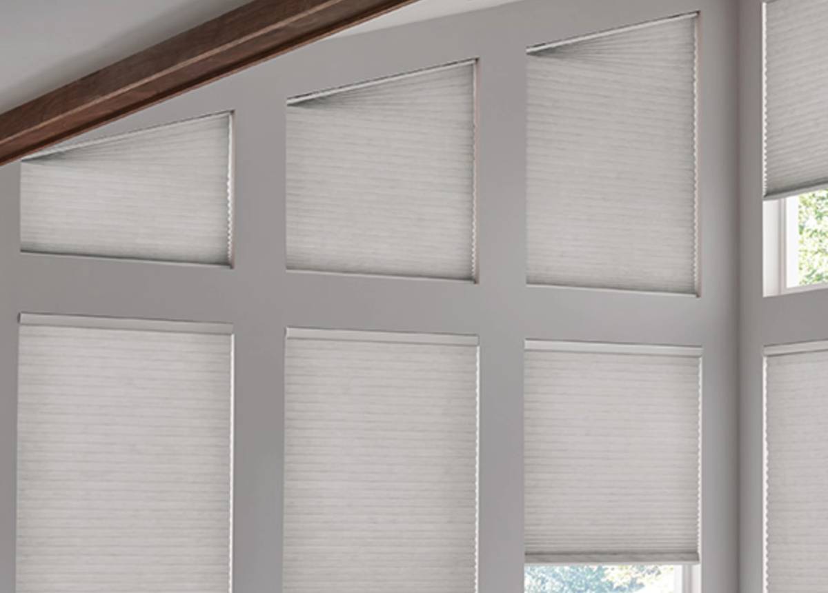 Alta Honeycomb Shades on an angled window near Natick, MA